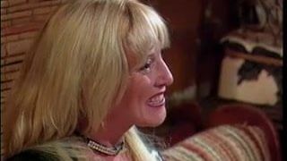 Sexy brunette slut gets face fucked by a massive strap on